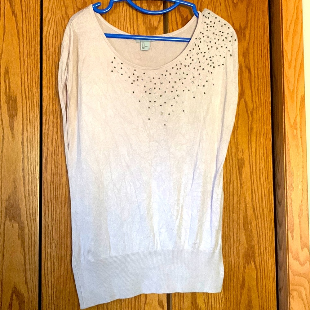Women’s blouse with beaded embellishments